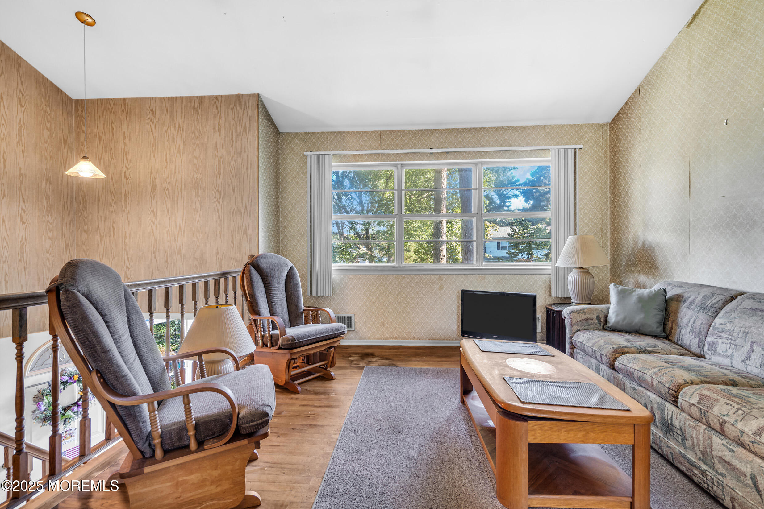 30 Russell Street Toms River, NJ 08753 - Photo 4 of 27 a living room with furniture and a fireplace