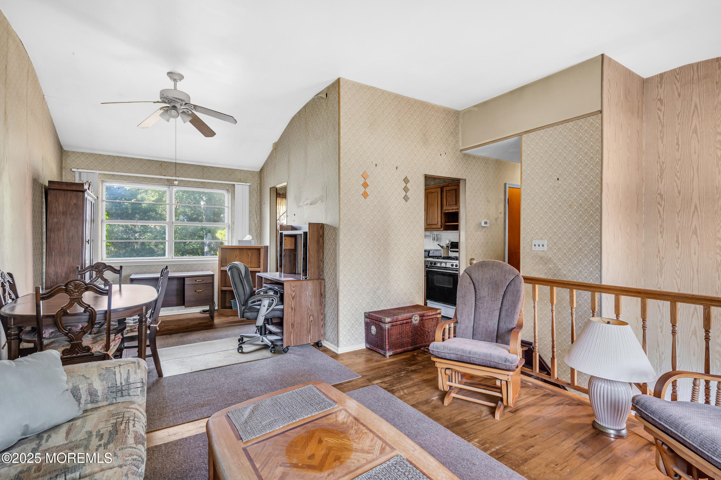 30 Russell Street Toms River, NJ 08753 - Photo 5 of 27 a living room with furniture two window and a flat screen tv