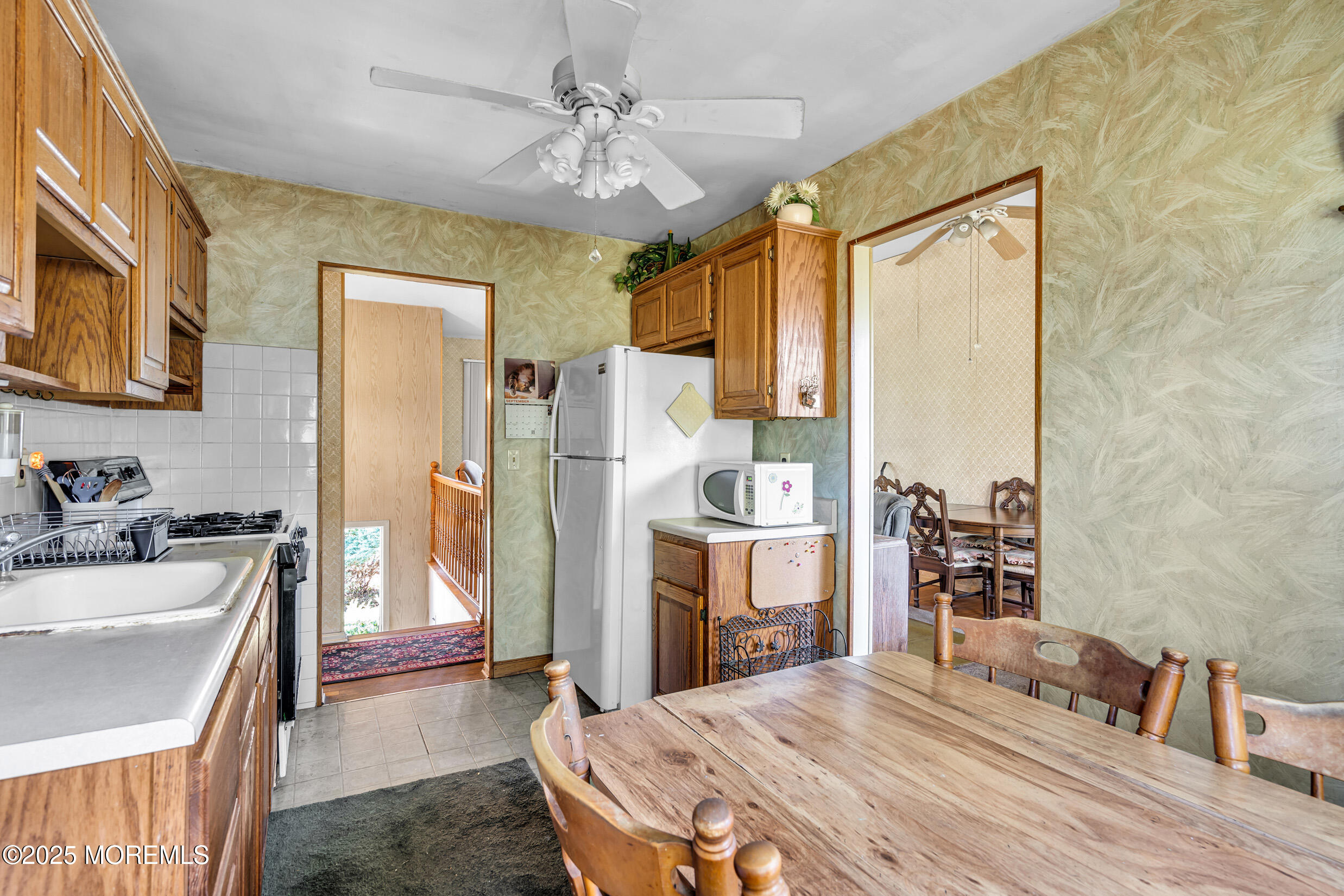 30 Russell Street Toms River, NJ 08753 - Photo 8 of 27 a bedroom with a bed dresser and a flat tv screen