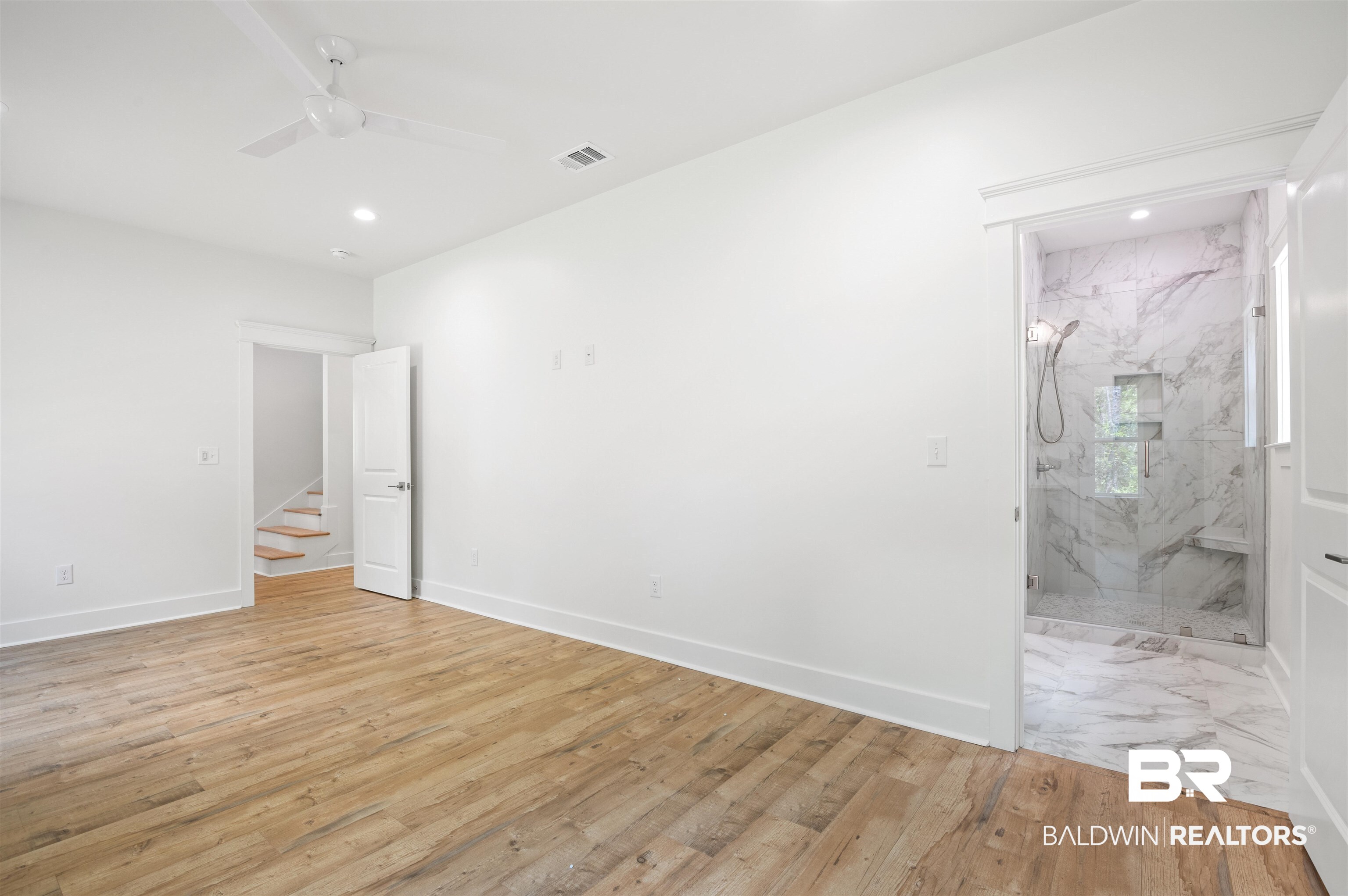 657 Island Way Gulf Shores, AL 36542 - Photo 16 of 59 Empty room with recessed lighting, a ceiling fan, baseboards, and light wood-style flooring
