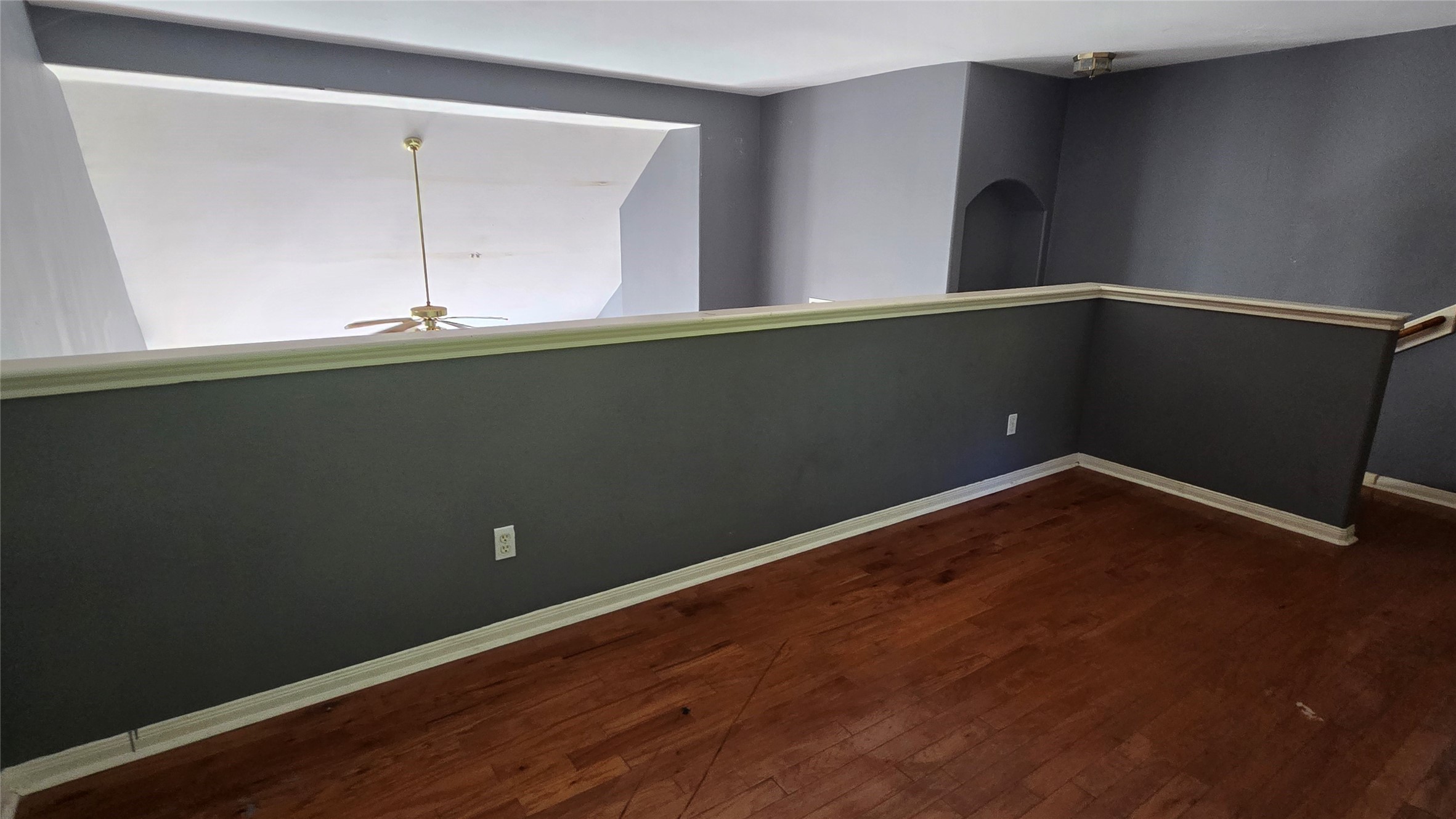 131 Annes Way Stafford, TX 77477 - Photo 21 of 25 an empty room with wooden floor and fan