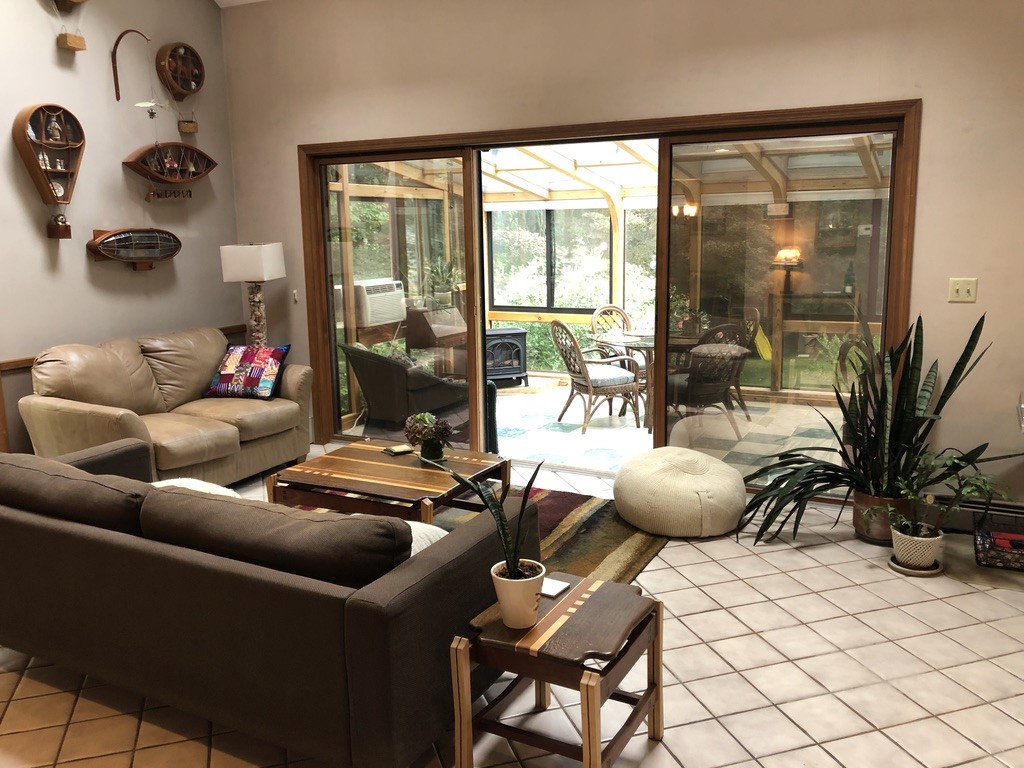 161 Sloop Street Jamestown, RI 02835 - Photo 21 of 50 Living room to 4 season Sun room