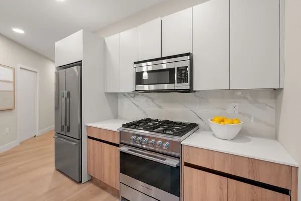 $985,000 | 249 Corey Road, Unit 409, Boston, MA 02135
