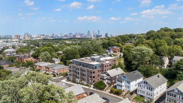 $985,000 | 249 Corey Road, Unit 409, Boston, MA 02135