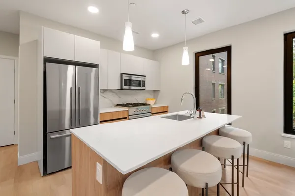 $985,000 | 249 Corey Road, Unit 409, Boston, MA 02135