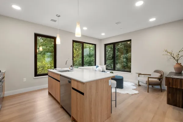 $985,000 | 249 Corey Road, Unit 409, Boston, MA 02135