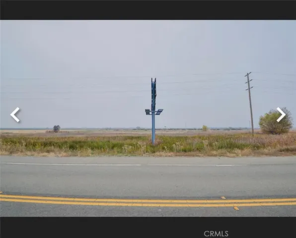 a view of an ocean and mountain