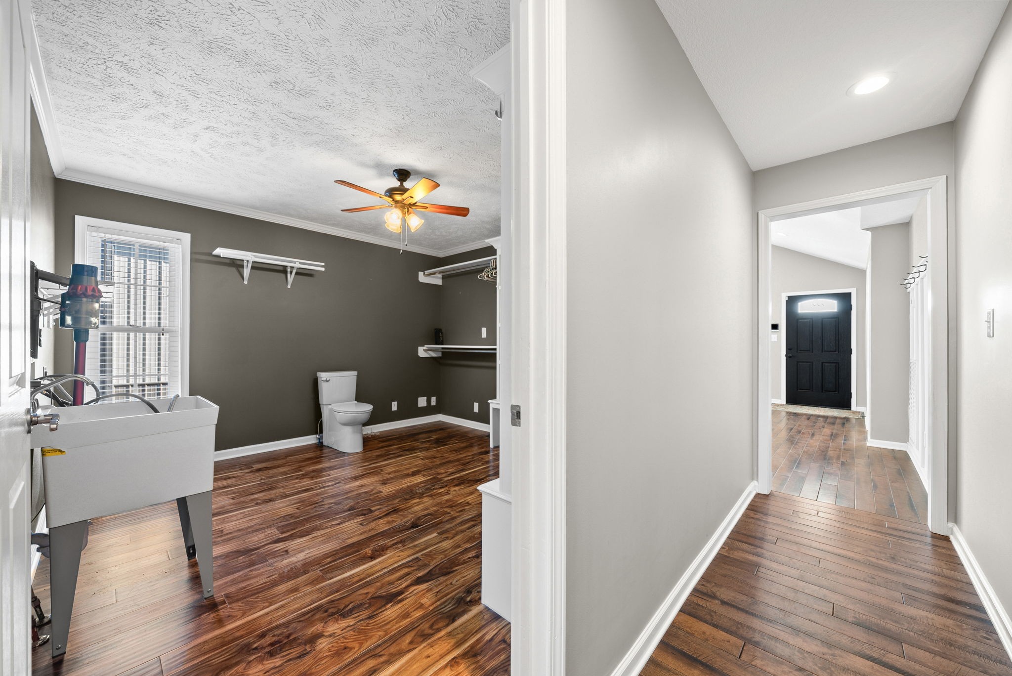2875 Jarrell Ridge Road Clarksville, TN 37043 - Photo 11 of 73 a view of a hallway with wooden floor and furniture
