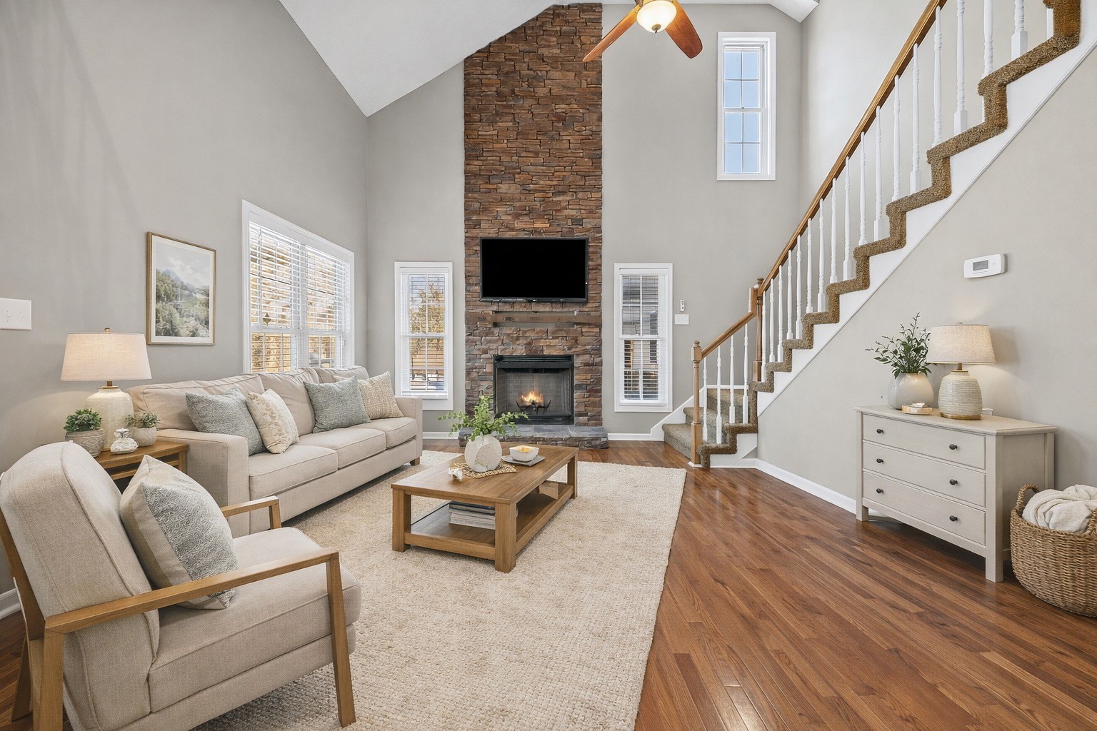 2875 Jarrell Ridge Road Clarksville, TN 37043 - Photo 14 of 73 a living room with furniture a fireplace and a flat screen tv
