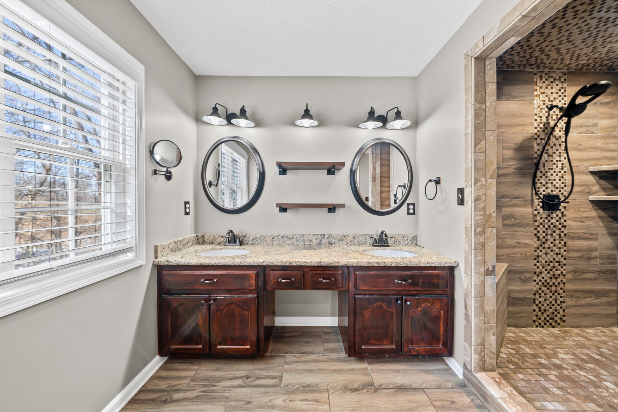 2875 Jarrell Ridge Road Clarksville, TN 37043 - Photo 26 of 73 a bathroom with a granite countertop sink and a large mirror