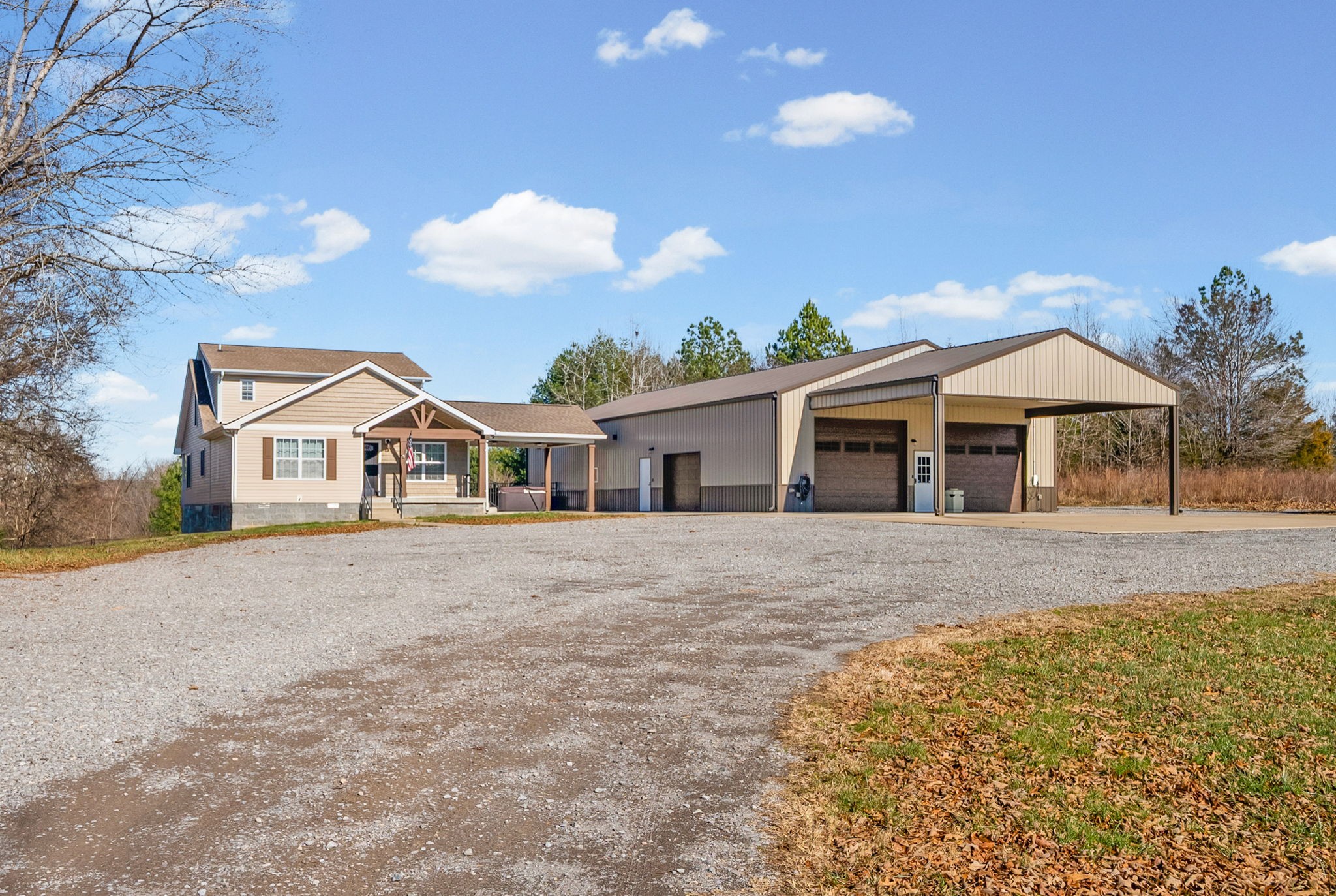 2875 Jarrell Ridge Road Clarksville, TN 37043 - Photo 3 of 73 a front view of a house with a yard and garage
