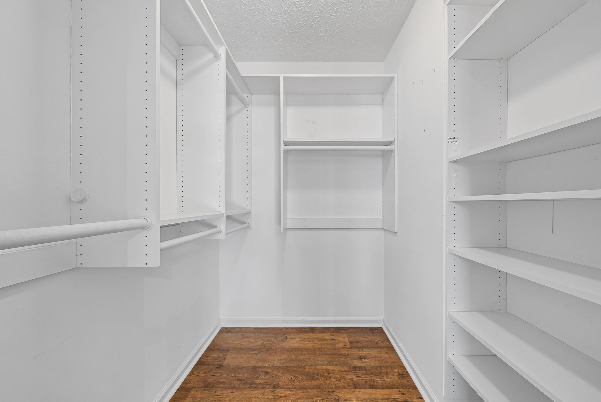 2875 Jarrell Ridge Road Clarksville, TN 37043 - Photo 39 of 73 a view of walk in closet with empty racks