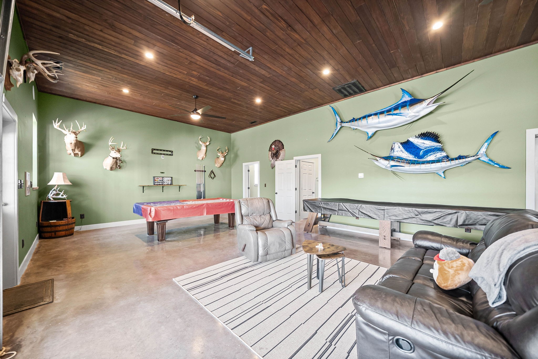 2875 Jarrell Ridge Road Clarksville, TN 37043 - Photo 57 of 73 a living room with furniture and a wooden floor