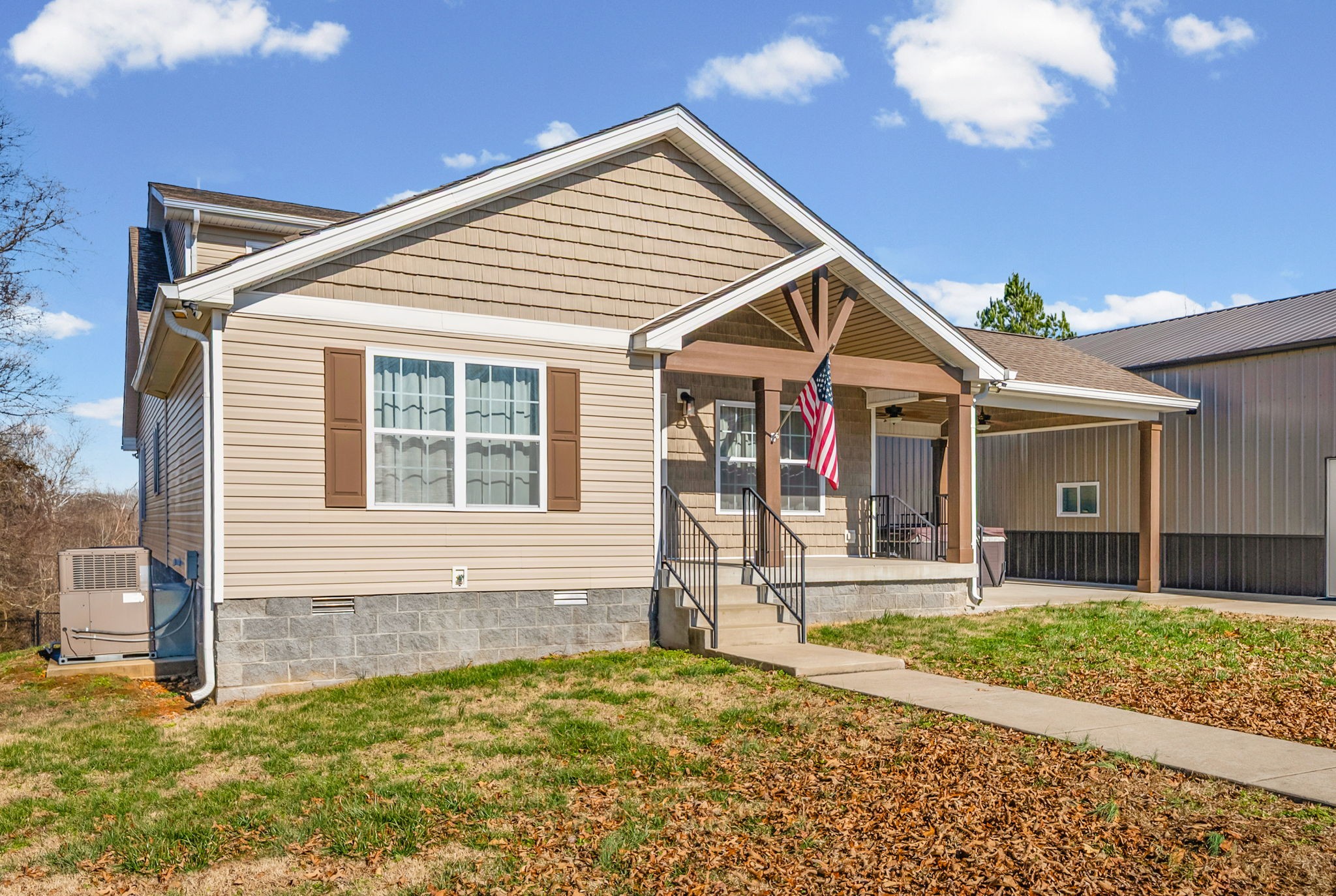 2875 Jarrell Ridge Road Clarksville, TN 37043 - Photo 6 of 73 a front view of a house with garden