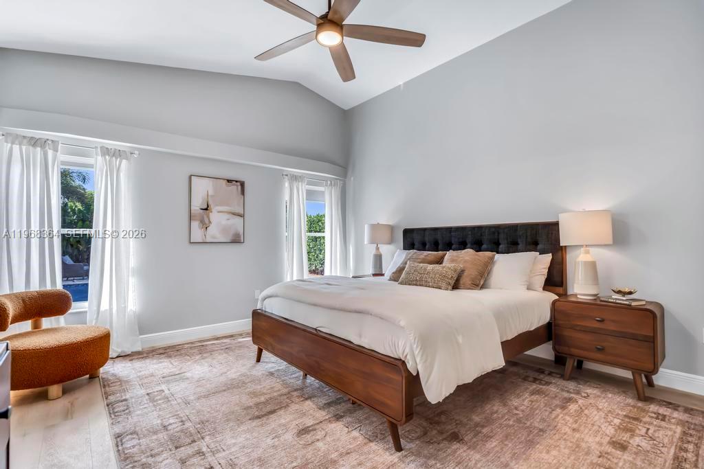2972 Southwest 174th Avenue Miramar, FL 33029 - Photo 17 of 55 a bedroom with a bed and wooden floor