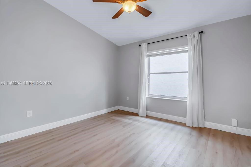 2972 Southwest 174th Avenue Miramar, FL 33029 - Photo 29 of 55 wooden floor in an empty room with a window