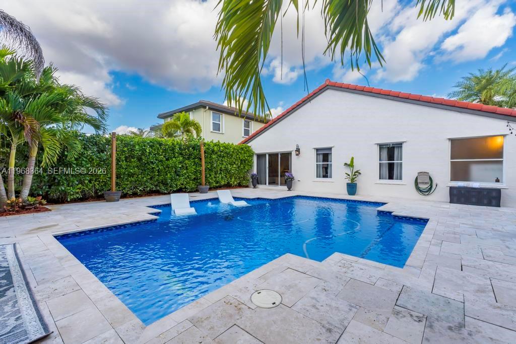 2972 Southwest 174th Avenue Miramar, FL 33029 - Photo 33 of 55 a view of a house with swimming pool with sitting area