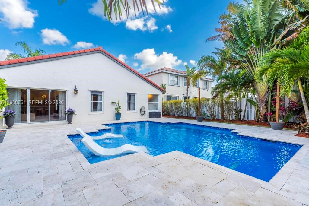 2972 Southwest 174th Avenue Miramar, FL 33029 - Photo 34 of 55 a view of a house with swimming pool and sitting area