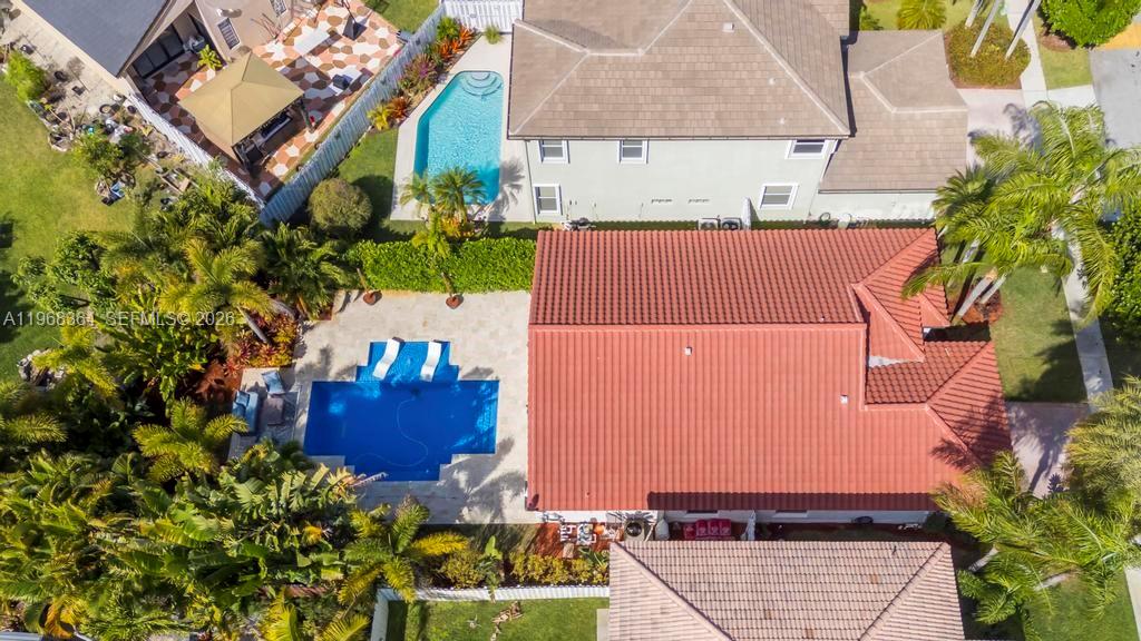 2972 Southwest 174th Avenue Miramar, FL 33029 - Photo 38 of 55 an aerial view of a house with a yard and sitting space