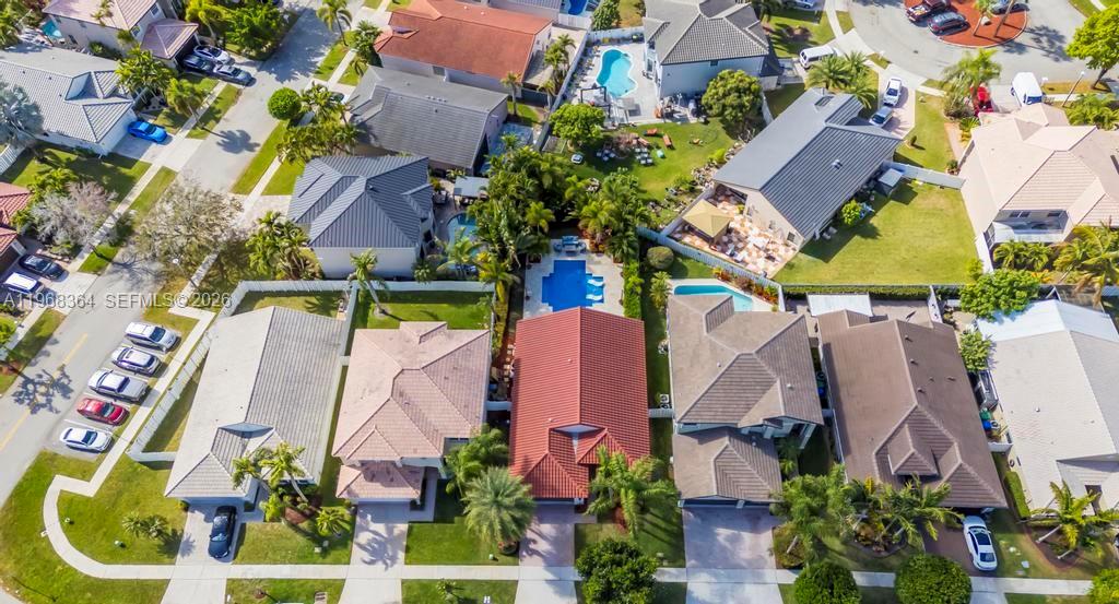 2972 Southwest 174th Avenue Miramar, FL 33029 - Photo 44 of 55 an aerial view of a house with a yard and outdoor seating