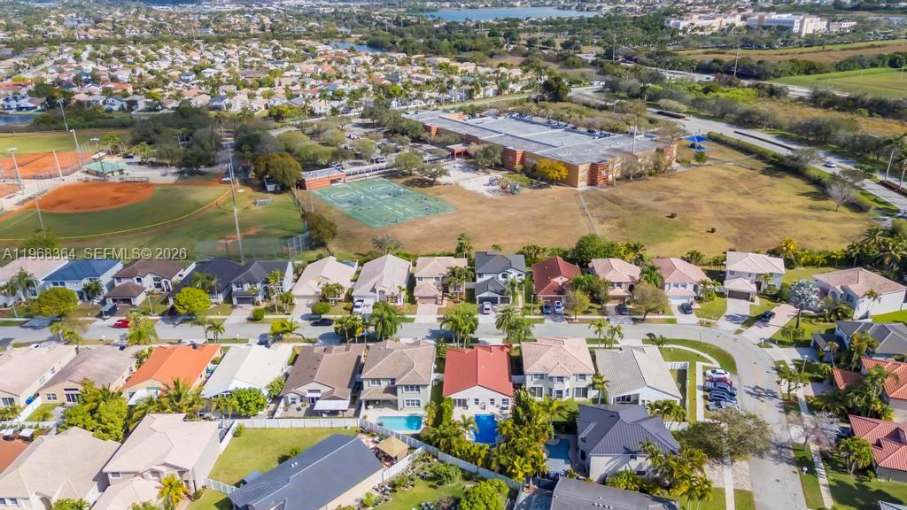 2972 Southwest 174th Avenue Miramar, FL 33029 - Photo 46 of 55 an aerial view of residential houses with outdoor space