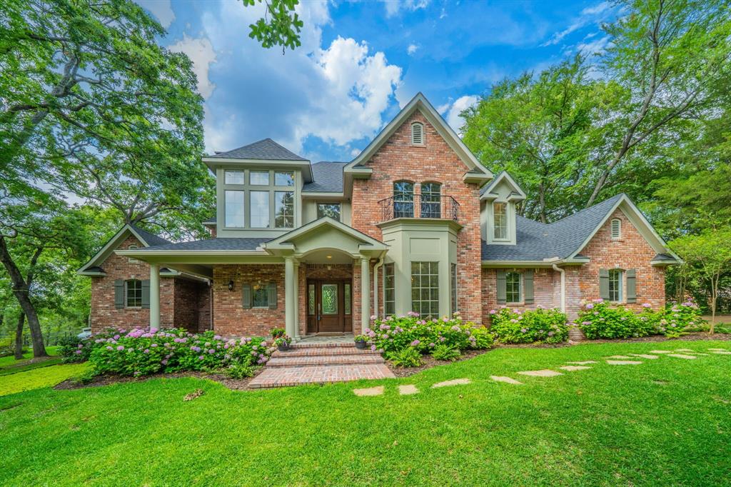 7451 County Road 1509 Athens, TX 75751 - Photo 1 of 36 a front view of a house with a yard
