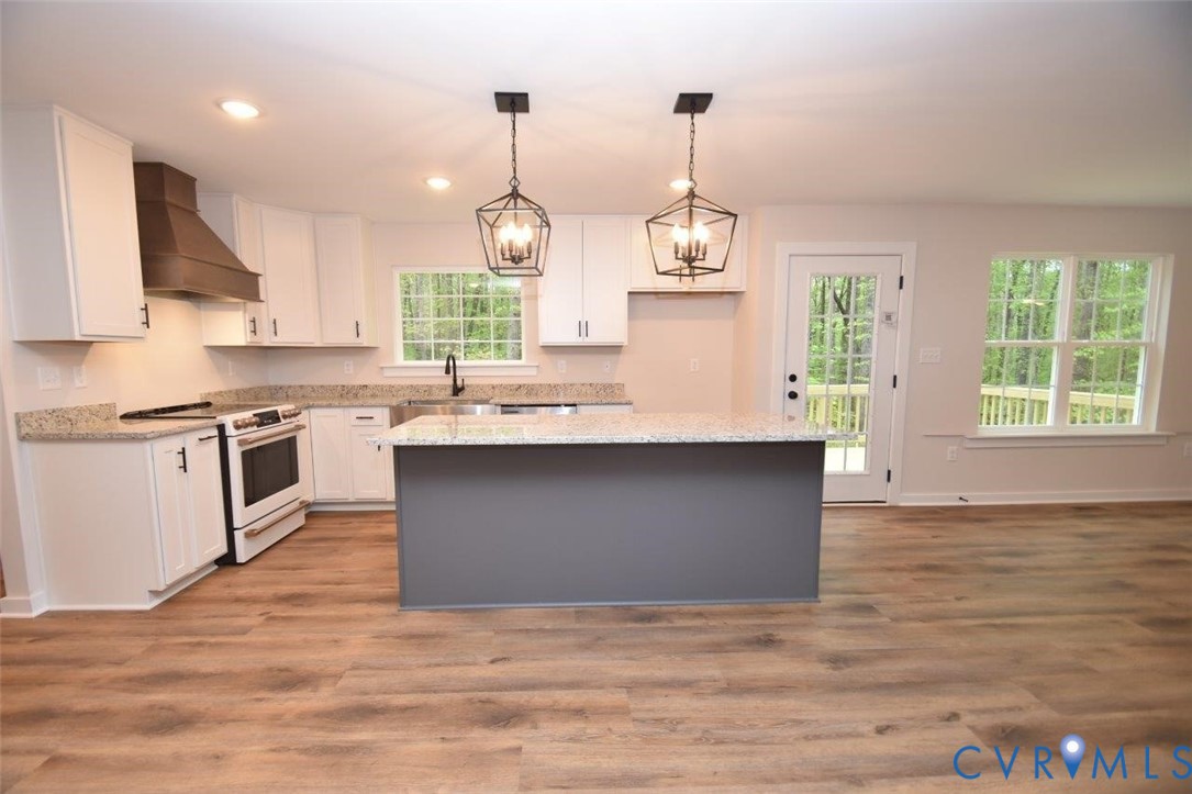 1749 Hollands Road Palmyra, VA 22963 - Photo 13 of 40 Kitchen featuring decorative light fixtures, white
