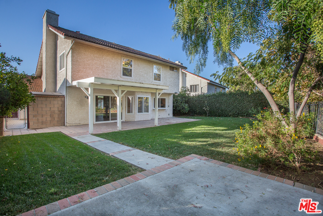 13639 Bear Valley Road Moorpark, CA 93021 - Photo 23 of 25 a view of a house with a yard