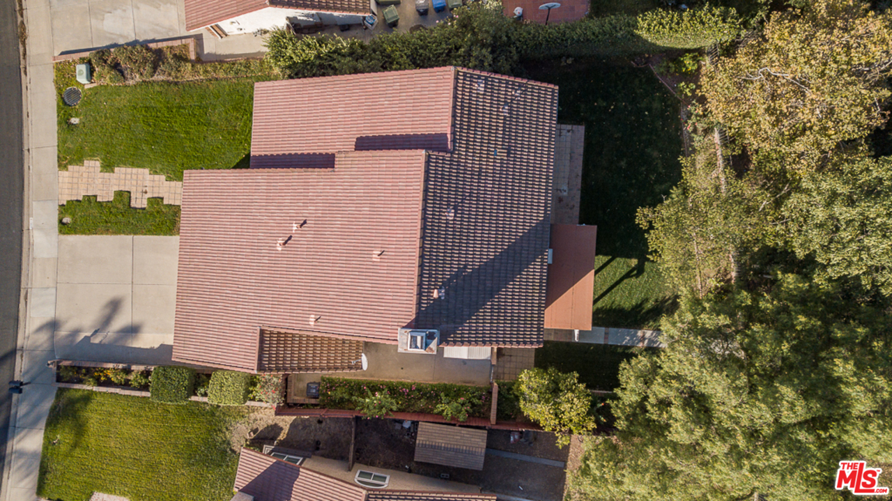 13639 Bear Valley Road Moorpark, CA 93021 - Photo 24 of 25 an aerial view of a house with a yard