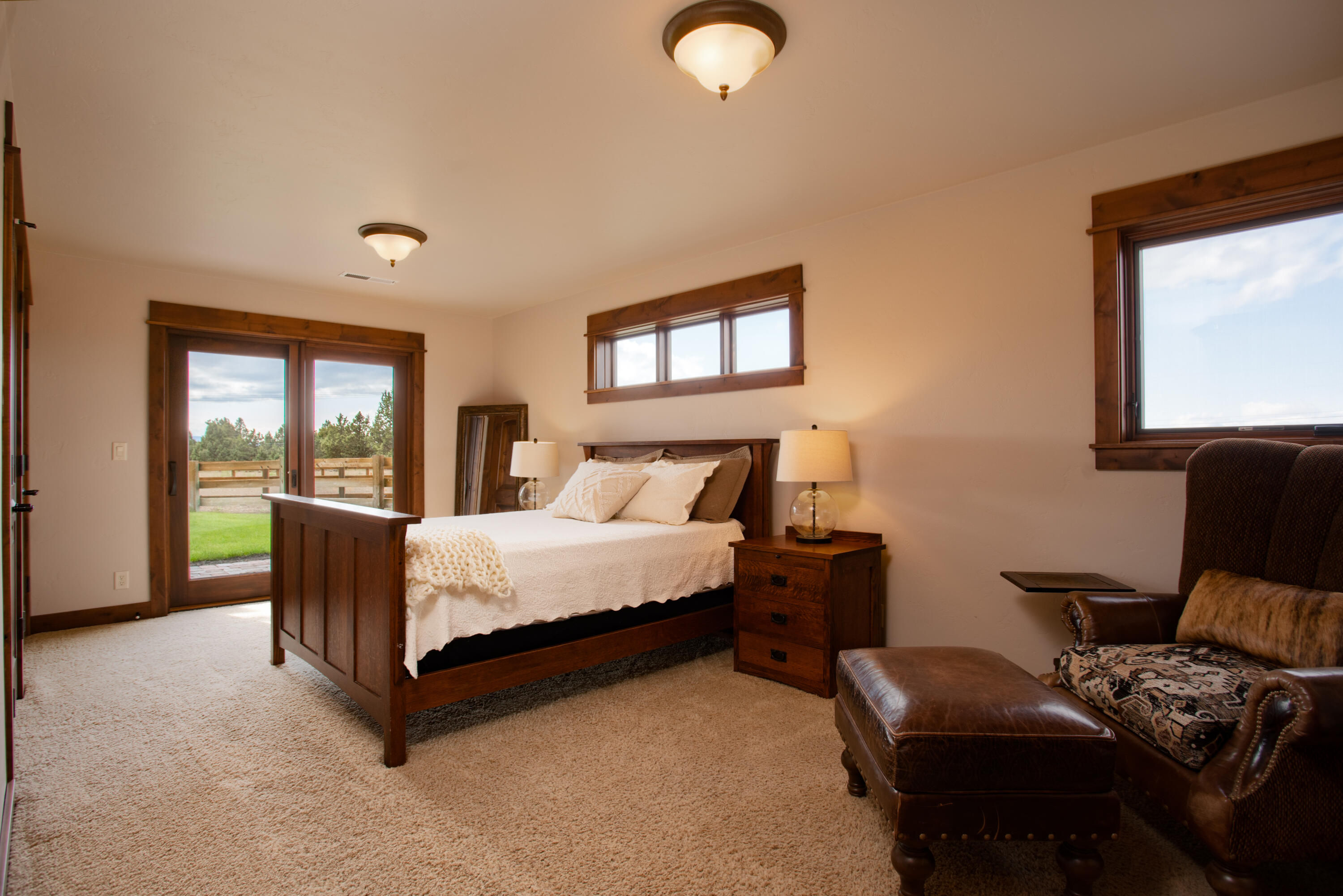 61405 Ward Road Bend, OR 97702 - Photo 14 of 37 a bed room with furniture and a window