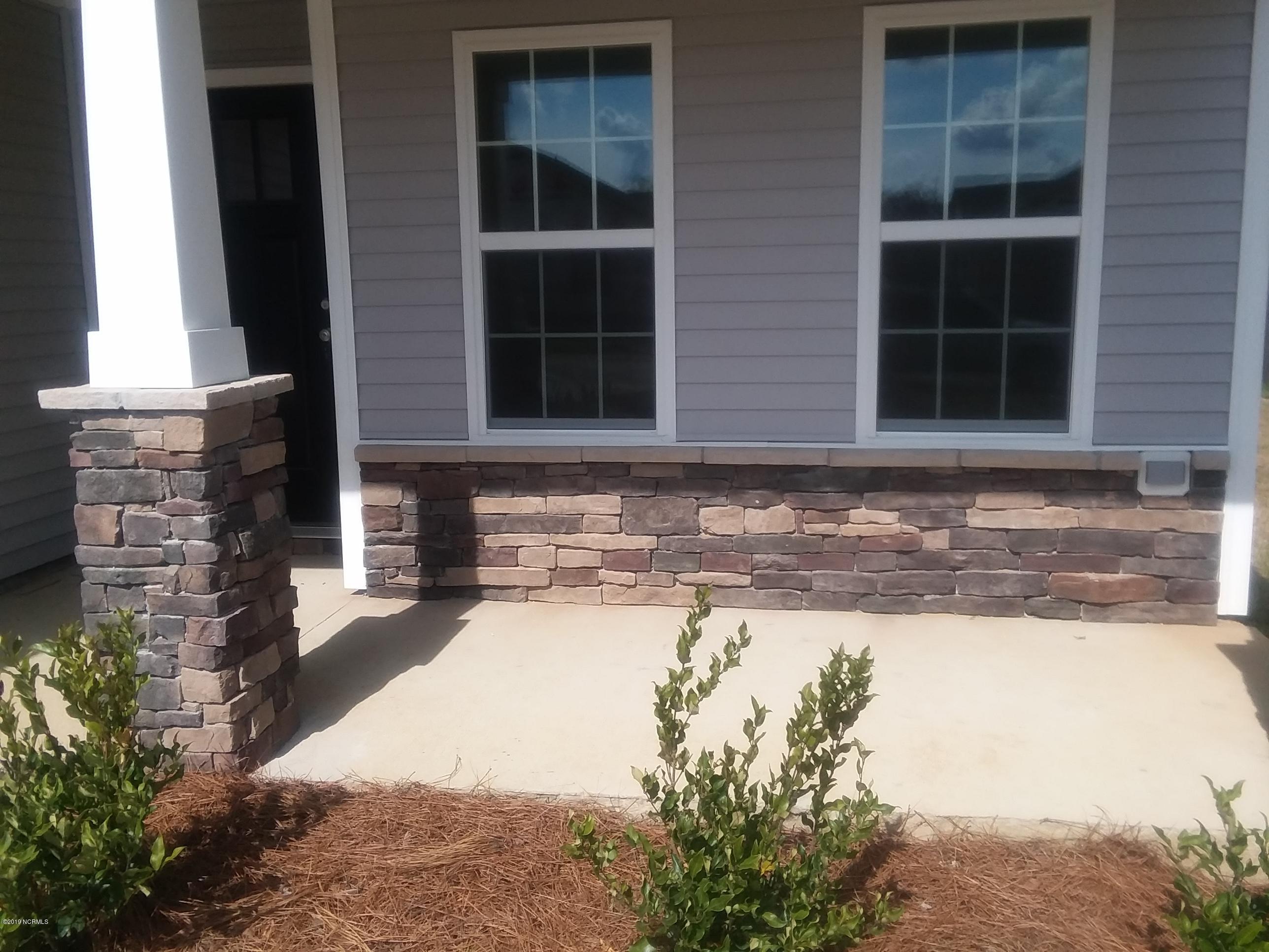 872 Rolling Pines Loop Road Leland, NC 28451 - Photo 2 of 14 Stone Accents