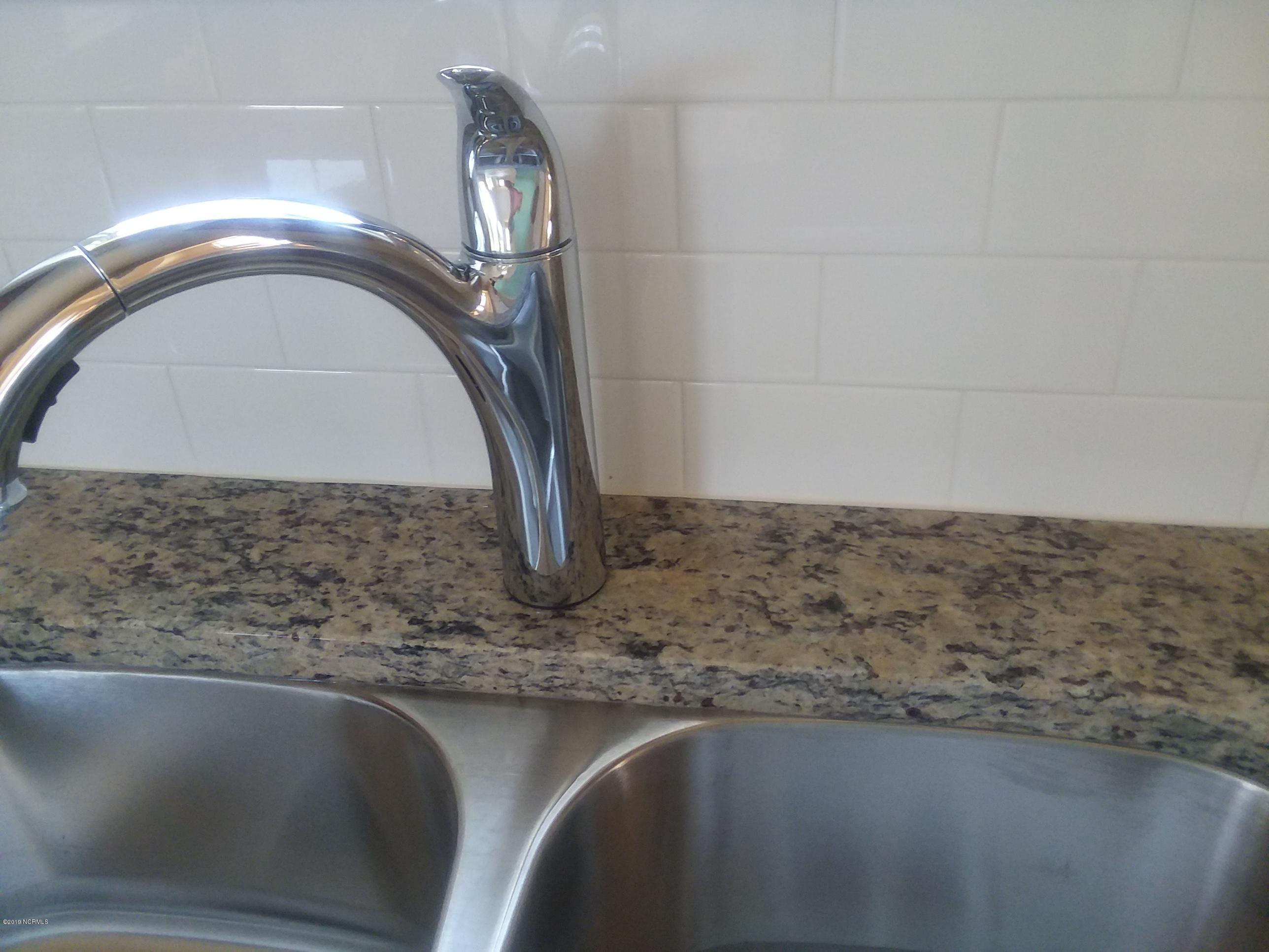 872 Rolling Pines Loop Road Leland, NC 28451 - Photo 7 of 14 Granite Tops and Tile Backsplash