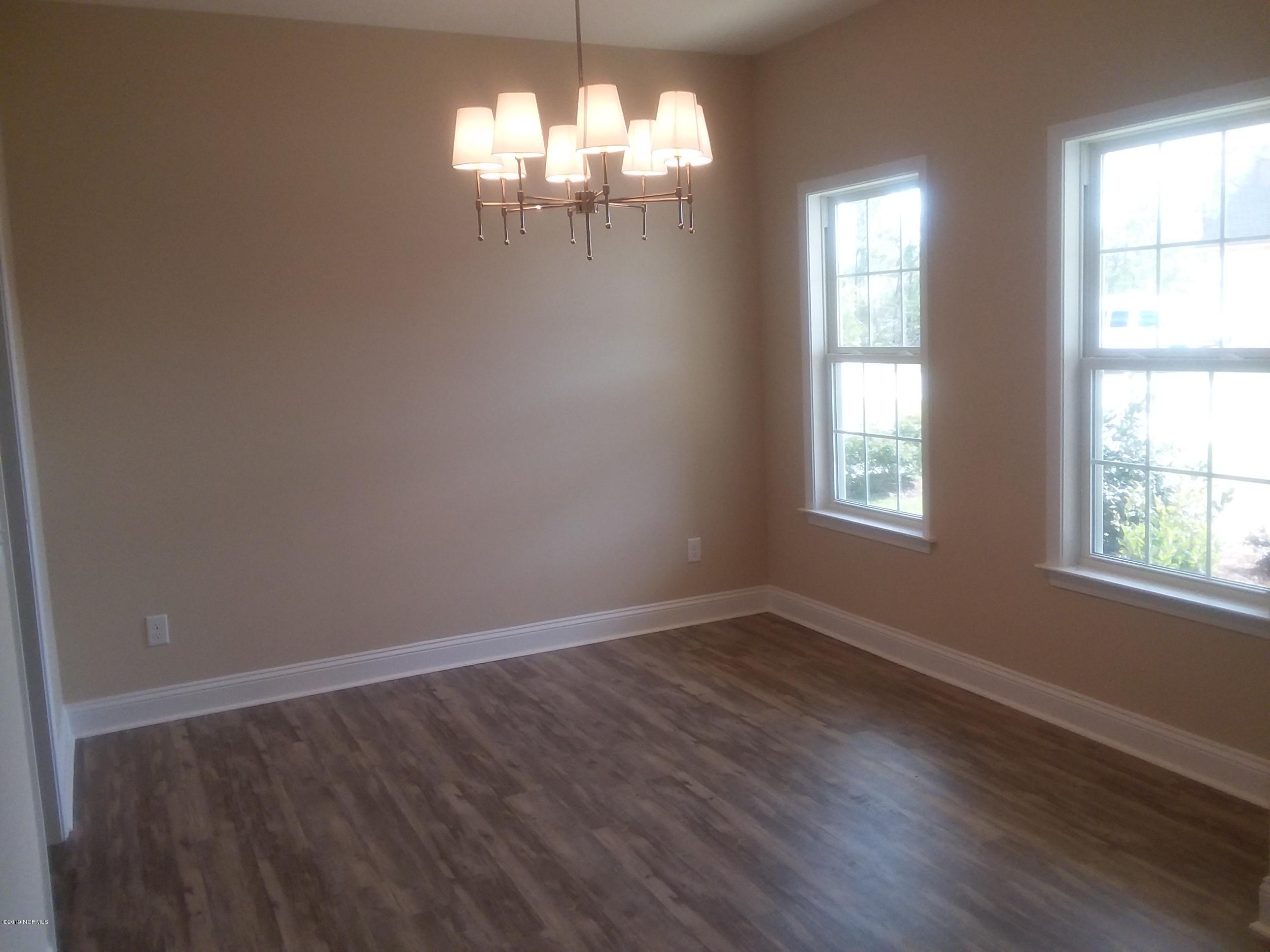 872 Rolling Pines Loop Road Leland, NC 28451 - Photo 9 of 14 Formal Dining Room