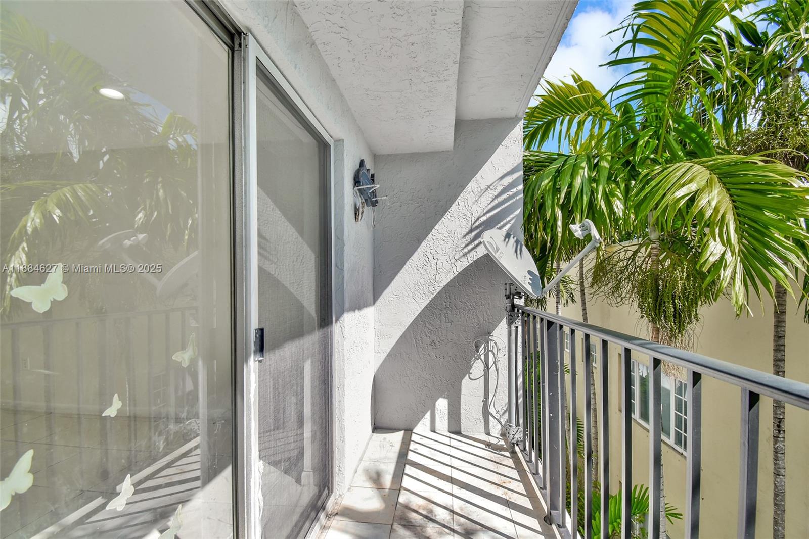 618 Euclid Avenue, Unit 303 Miami Beach, FL 33139 - Photo 16 of 26 a view of balcony with wooden floor