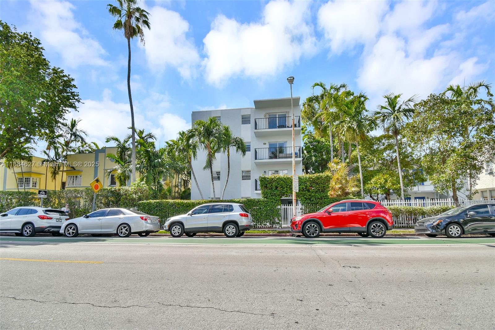 618 Euclid Avenue, Unit 303 Miami Beach, FL 33139 - Photo 22 of 26 a view of cars parked in front of a building