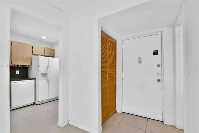 a view of a storage & utility room with a sink