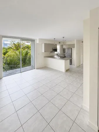 a view of kitchen with furniture and large window