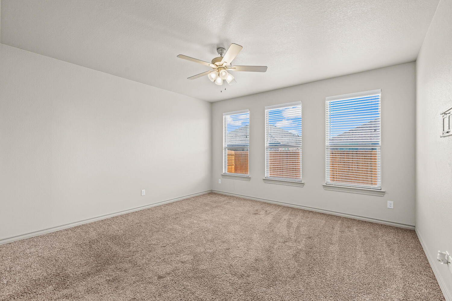 7613 61st Street Lubbock, TX 79407 - Photo 24 of 37 a view of an empty room with a window