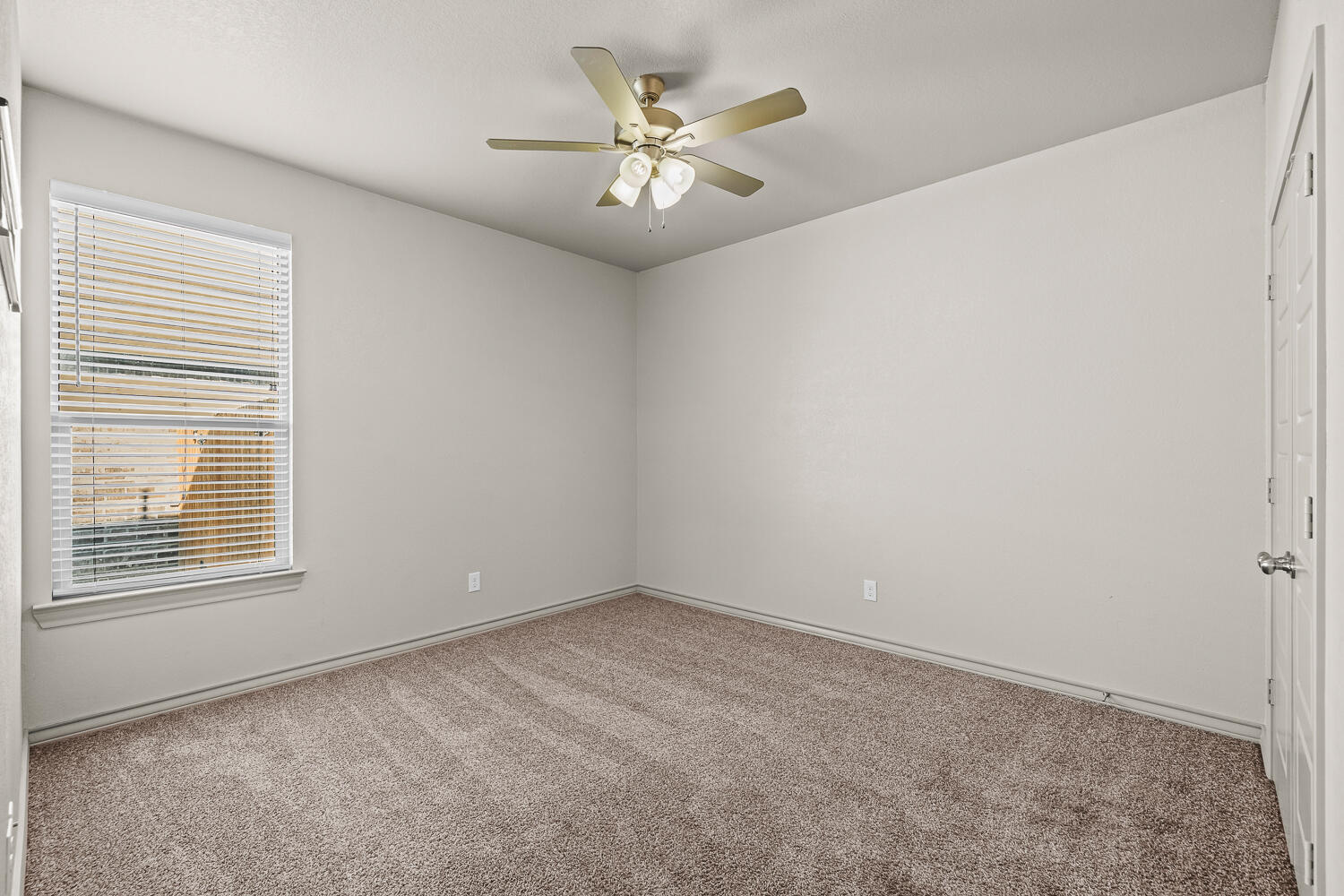 7613 61st Street Lubbock, TX 79407 - Photo 25 of 37 a view of an empty room with a window