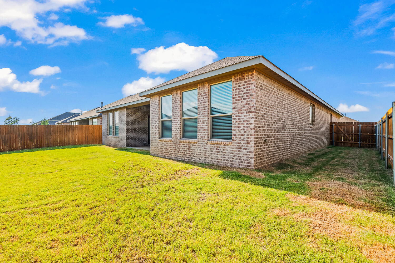 7613 61st Street Lubbock, TX 79407 - Photo 37 of 37 a view of a house with a backyard