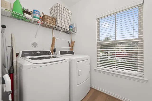 a utility room with dryer and washer