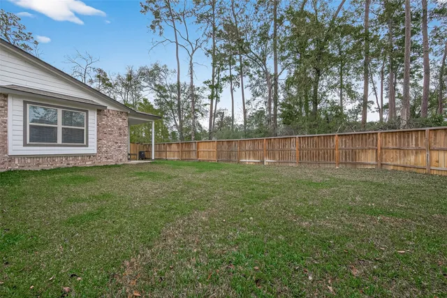 a view of a backyard with a garden