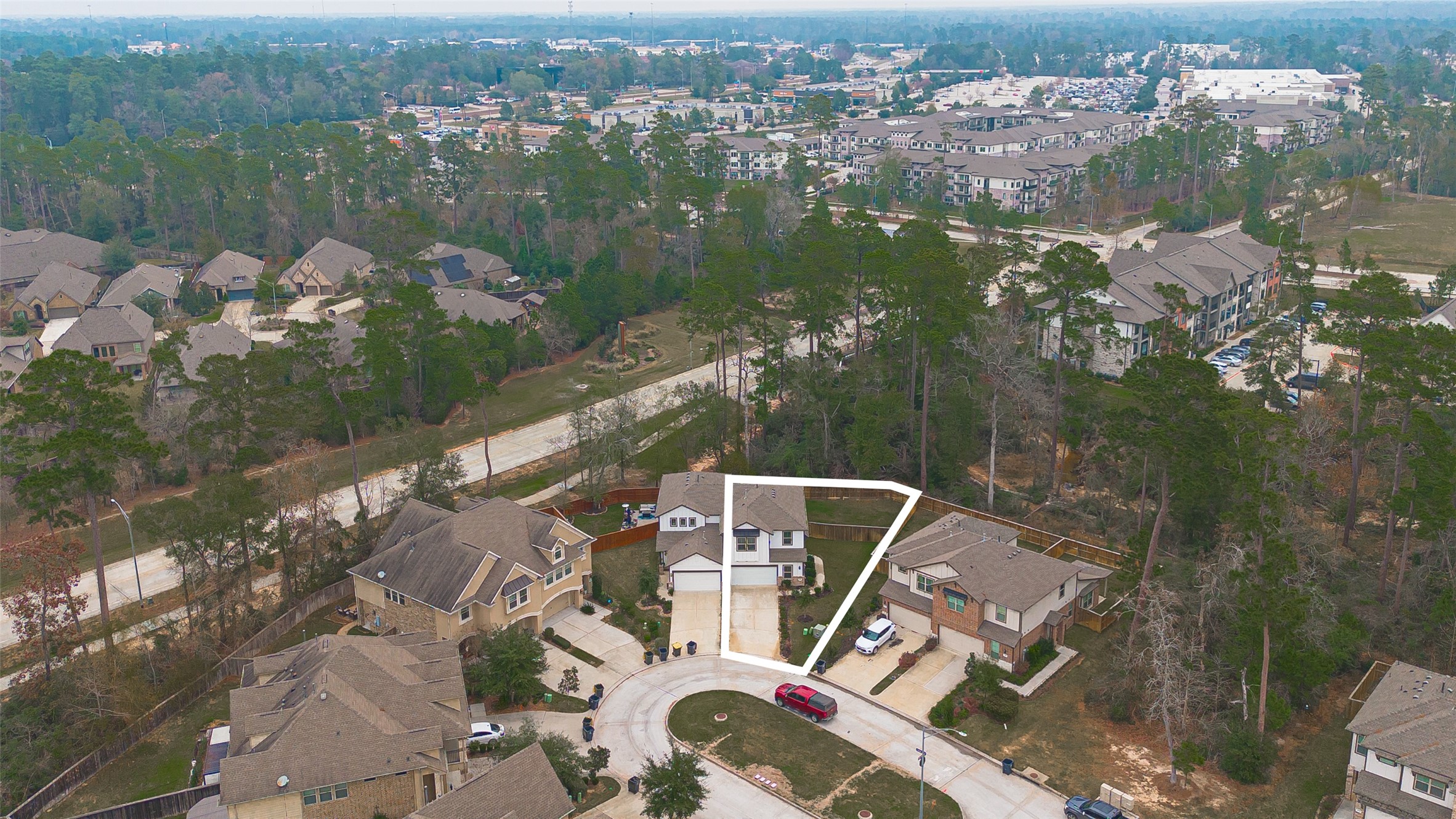 218 Skybranch Court Conroe, TX 77304 - Photo 4 of 50 a view of a lake in middle of the town