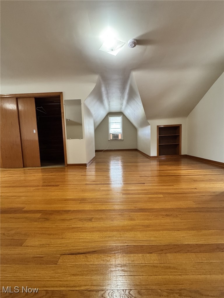 3712 Snow Road Cleveland, OH 44134 - Photo 27 of 40 Additional living space featuring lofted ceiling and wood finished floors