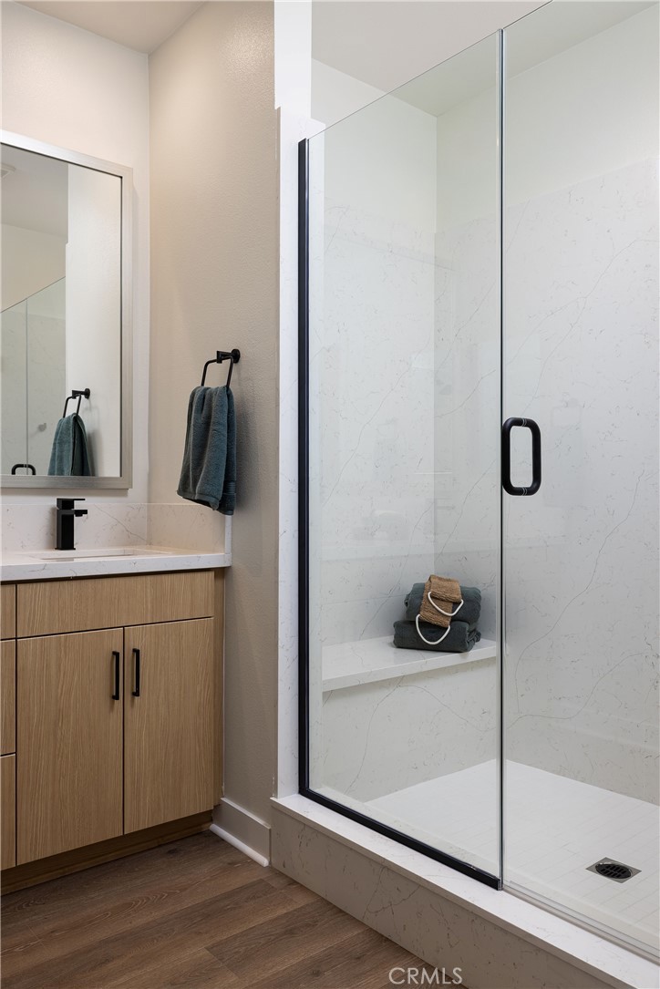 102 South Orchid El Cajon, CA 92019 - Photo 12 of 22 a bathroom with a sink and a mirror