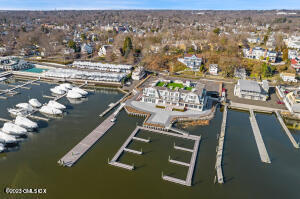 89 River Road, Unit 306 Cos Cob, CT 06807 - Photo 27 of 27 an aerial view of a house with a ocean view