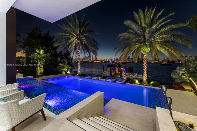 a view of a building with swimming pool