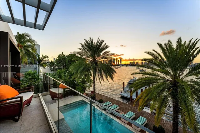 a bathroom with a tub shower sink and toilet