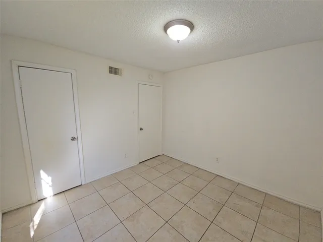 a bathroom with a sink toilet and mirror