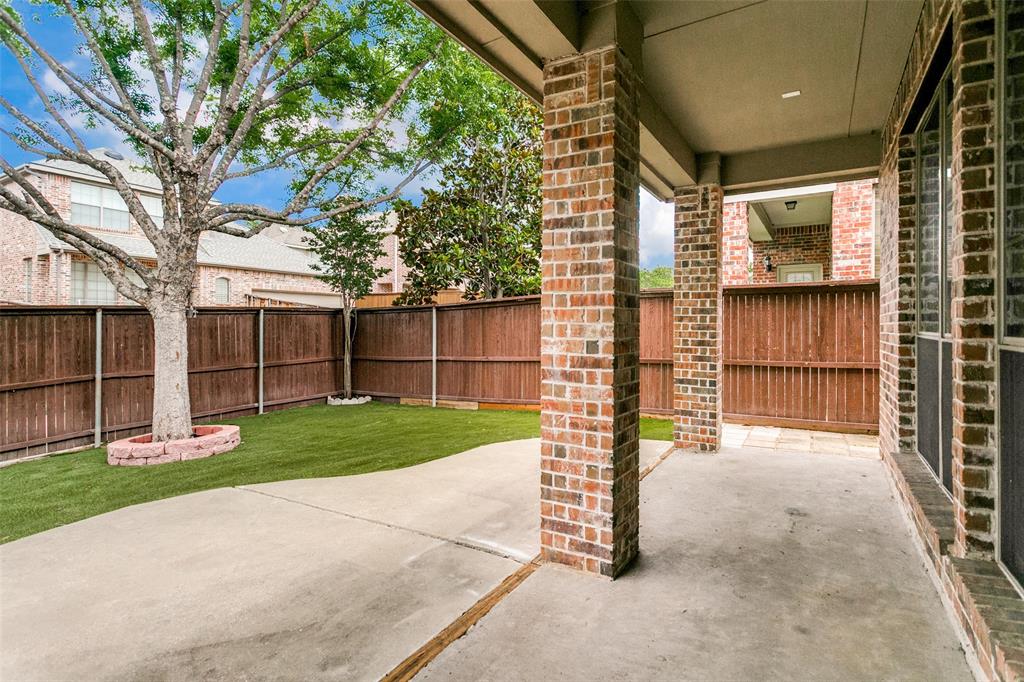 1148 Amy Drive Allen, TX 75013 - Photo 11 of 12 Covered and extended Patio Big Trees and lush greens